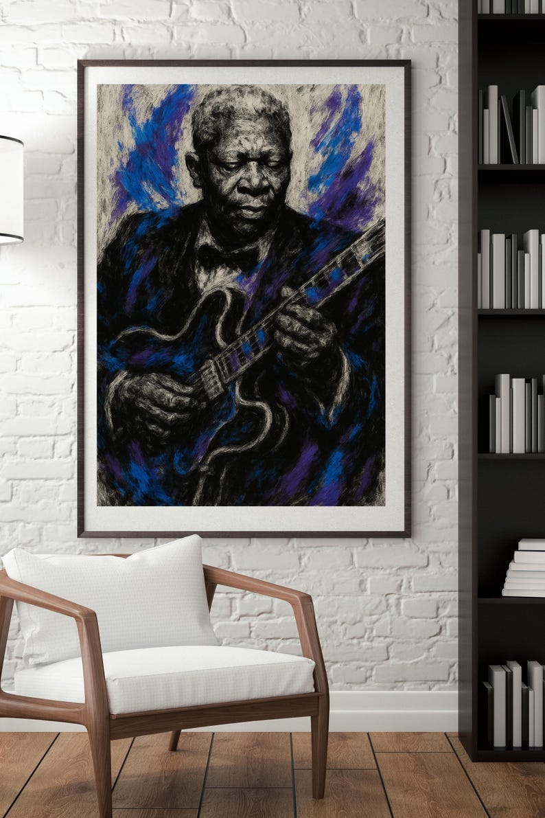 May include: Framed art print of a man playing a guitar, rendered in a blue, black, and white color palette. The artwork features a portrait of a musician in a suit and bow tie, holding a blue guitar. The background has blue and purple brushstrokes.