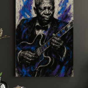 May include: A portrait of B.B. King playing a blue guitar. The artwork uses a charcoal style with blue and purple accents against a white and gray background. The subject is wearing a black suit and bow tie.