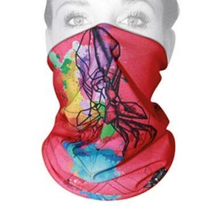 May include: A red face covering with a colorful abstract design featuring a black outline of a sea creature. The design incorporates shades of pink, purple, blue, and yellow. The face covering is shown against a white background.