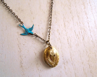 Vintage Brass Oval Locket Necklace: Blue Bird & Pearl Charm