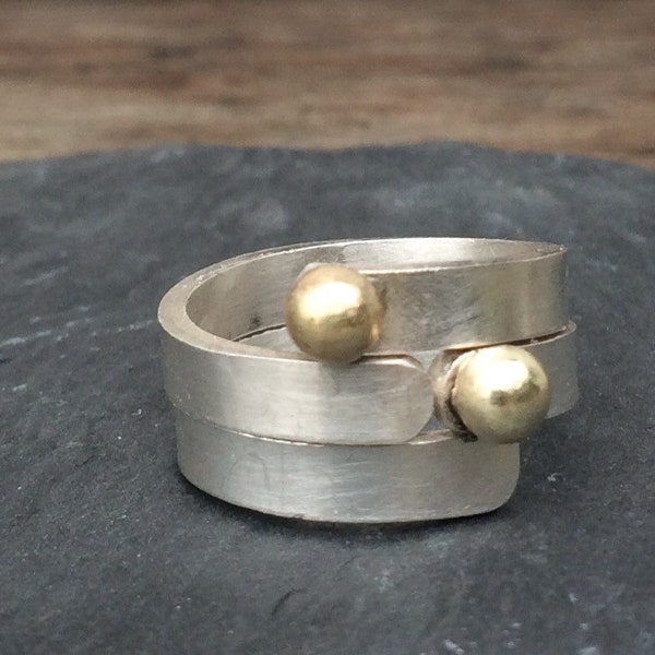 Stack of rings with gold nuggets, adjustable for arthritis sufferers