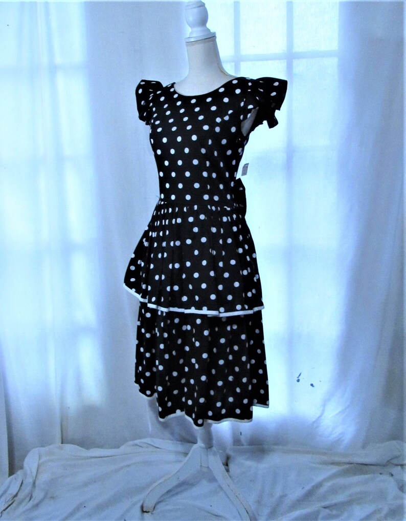 polka dot peplum dress