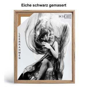 May include: A black and white photograph of a couple dancing the tango. The woman is wearing a long black dress and the man is wearing a black suit. The image is framed in a natural wood frame with the text "PCH ART" in the top right corner.