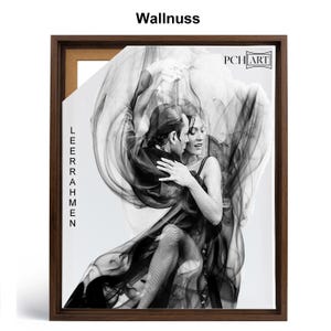 May include: A black and white photograph of a couple dancing the tango. The woman is wearing a black dress and the man is wearing a black suit. The couple is surrounded by a swirling cloud of smoke.