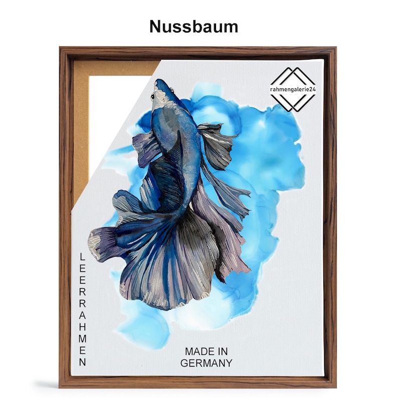 May include: A framed canvas print of a blue betta fish with a long, flowing tail. The fish is swimming in a blue and white watercolor background. The frame is made of wood and has a brown finish. The text "MADE IN GERMANY" is printed on the canvas.