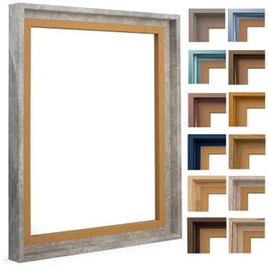Può includere: Una cornice rettangolare con finitura grigio invecchiato e bordo interno marrone chiaro. La cornice è mostrata con una varietà di campioni angolari in diversi colori e finiture, tra cui tonalità legno e opzioni verniciate.