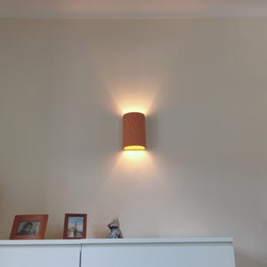 Ceramic sconce handmade wall light cylinder sconce up and down terracotta colour