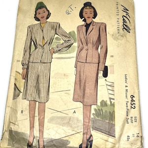 May include: Vintage McCall printed pattern for a ladies' two-piece suit, featuring illustrations of the designs. The pattern includes a striped suit and a solid-colored suit. The pattern number is 6452, with a bust size of 32.