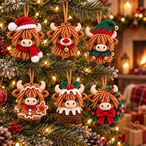 May include: Six crocheted Highland cow ornaments hanging on a Christmas tree. The cows feature various holiday themes including a Santa hat and scarf, a reindeer nose, an elf hat, a gingerbread man, a Christmas pudding, and a festive wreath.