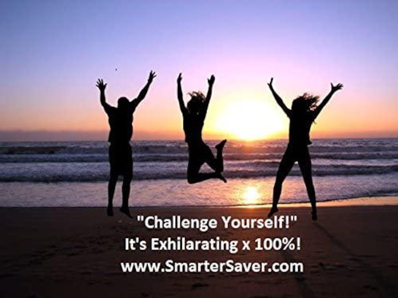 May include: Three silhouettes of people jumping in the air with their arms raised on a beach at sunset. The text "Challenge Yourself!" is below the silhouettes, followed by "It's Exhilarating x 100%!" and "www.SmarterSaver.com".