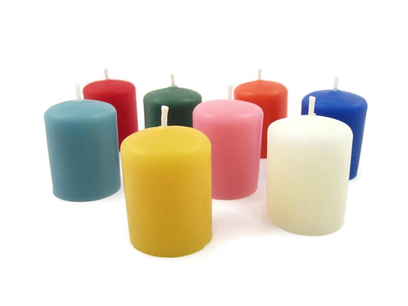 Available in sets of 4, colored beeswax votive candles.