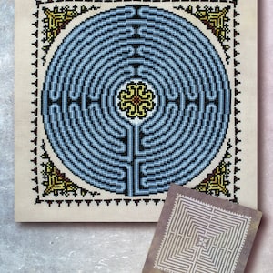 May include: Two embroidered designs of a labyrinth pattern. The first is a circular labyrinth with a blue and white color scheme and a yellow flower in the center. The second is a square labyrinth with a white color scheme on a brown background.