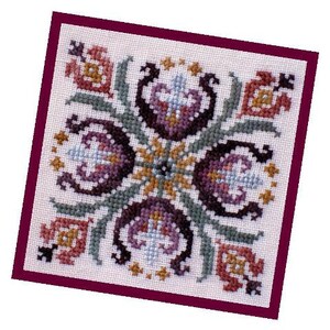 May include: A cross-stitch embroidery design featuring a floral pattern with purple, pink, blue, and yellow flowers on a white background. The design is framed with a burgundy border.