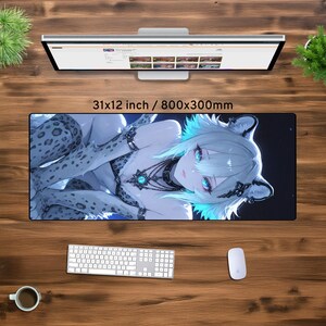 May include: A large mouse pad with a white and blue anime character design. The character is a woman with long white hair and blue eyes. She is wearing a white and black outfit with a silver necklace. The mouse pad is 31x12 inches or 800x300mm.