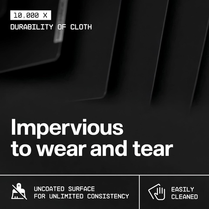 May include: Black background with white text that reads "10,000 X DURABILITY OF CLOTH" and "Impervious to wear and tear." Below are icons and text: "UNCOATED SURFACE FOR UNLIMITED CONSISTENCY" and "EASILY CLEANED."