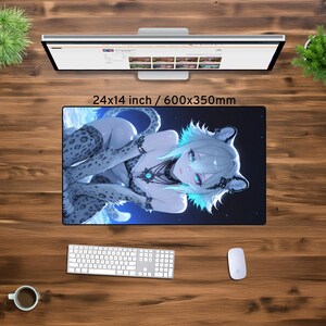 May include: A large mousepad featuring a digital illustration of a woman with long white hair and blue eyes. She is wearing a white and black outfit with a leopard print design. The background is a dark blue with stars. The mousepad is 24x14 inches or 600x350mm.