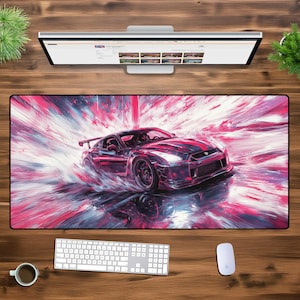 May include: A pink and white abstract design with a red sports car driving through the center of the design. The car is a Nissan Skyline GT-R.