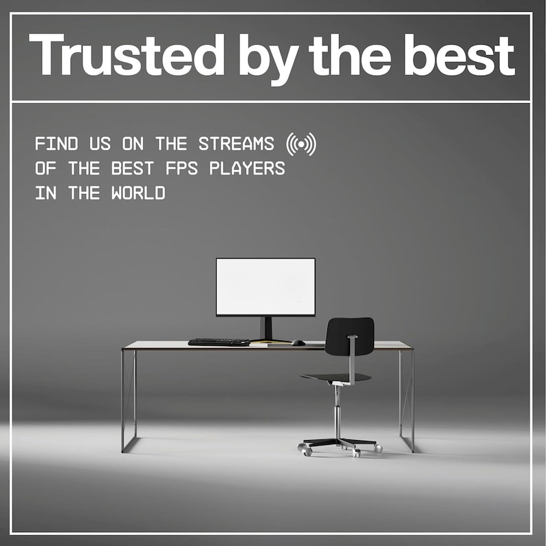 May include: A modern office setup featuring a computer monitor, keyboard, and mouse on a minimalist desk. A black office chair is positioned nearby. The text "Trusted by the best" and other text is displayed above the desk.