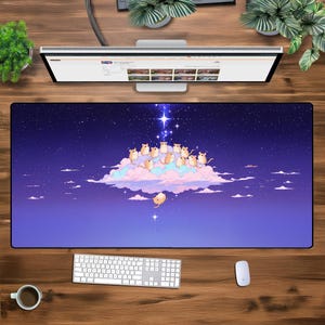 May include: A purple and blue mousepad with a starry night sky design. A cloud with a group of cartoon mice is in the center of the mousepad. The mice are looking up at a star.