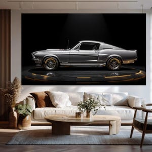 May include: A silver classic car, the Eleanor, is displayed on a circular platform with a spotlight against a black background. The car has gold-colored rims and a sleek design. The image is a large wall art print.