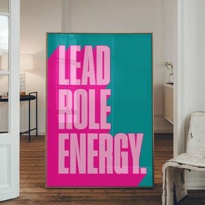 May include: A teal and pink motivational poster with the text "LEAD ROLE ENERGY."