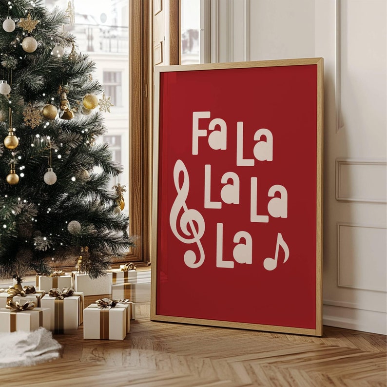 May include: A red framed poster with white text that reads "Fa La La La La" with a treble clef and a musical note.