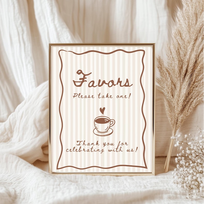 May include: A framed sign with the word "Favors" in a decorative font, along with the text "Please take one!" and "Thank you for celebrating with us!" A coffee cup graphic with a heart above it is also featured. The sign has a striped background.