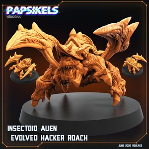 May include: A tan-colored, multi-legged insectoid alien miniature featuring a textured exoskeleton, sharp mandibles, and spiked protrusions. The figure is displayed on a black circular base with the text PAPSIKELS, INSECTOID ALIEN, EVOLVED HACKER ROACH, and JUNE 2026 RELEASE visible.