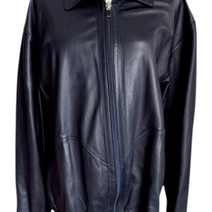 May include: A dark blue leather jacket with a zipper closure and a ribbed knit waistband.