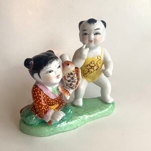 Vintage Figural of Children with a Fish, Milk Glass
