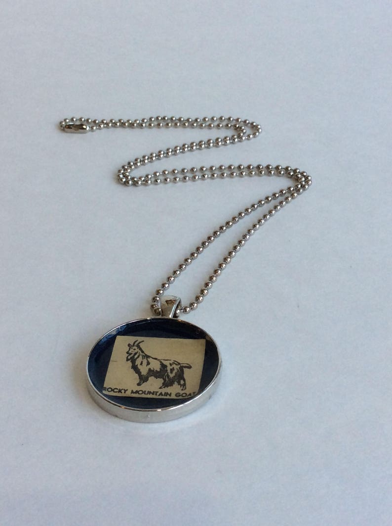 Vintage Rocky Mountain Goat Dictionary Pendant