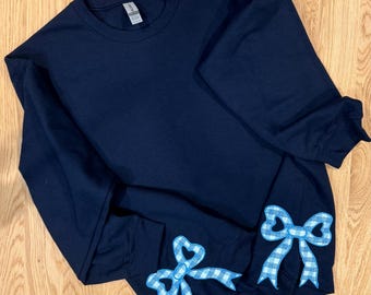Trendy Side Bow Cut-Out Sweatshirt Christmas and Hanukkah Gift for Her Stylish Holiday Pullover Perfect Festive Present Unique Seasonal Top