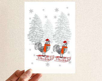 May include: Two roosters wearing red Santa hats and orange scarves are riding on red sleds in a snowy forest. The roosters are facing each other and the sleds are on a white background with gray trees and snowflakes.