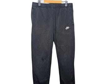 Nike black sweatpants size Large fleece joggers casual streetwear pants elastic waist comfy athletic style with pockets