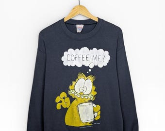 Maglione girocollo vintage con grafica a cartoni animati di Garfield "Coffee Me", nero, taglia M