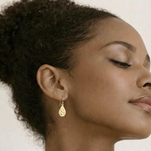 Golden drop earrings / dangle earrings made of 925 sterling silver / earrings with a hammered design