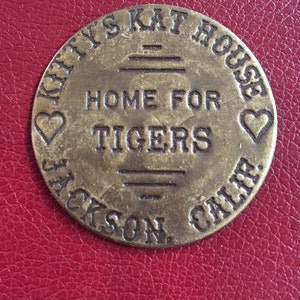 Kitty&#39;s Kat- Vintage Antiqued Brass Brothel Token-