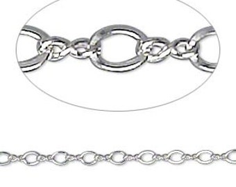 May include: Silver chain with a delicate, oval-shaped link design. The chain is smooth and shiny.