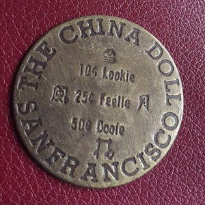 The China Doll - Vintage Antiqued Brass Brothel Token-