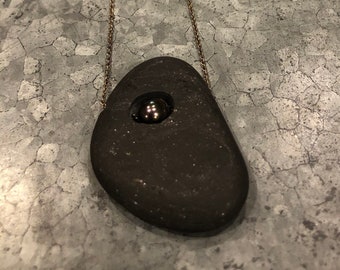 Black stone with black pearl