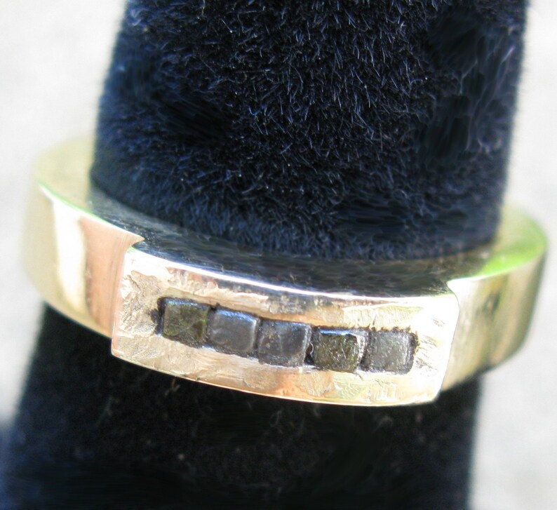 Five black diamonds in the rough on gold ring image 3