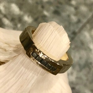 Five black diamonds in the rough on gold ring image 5