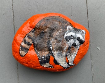 Raccoon painted rock paperweight