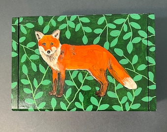 Hand-painted keepsake box with five different foxes