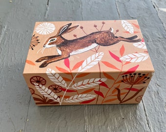 Unique hand-painted box with running hare and leaf decoration