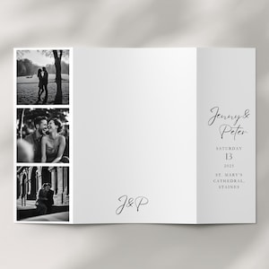 A gatefold wedding invitation on a neutral background