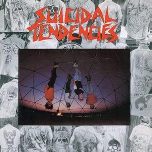 May include: Album cover featuring the band name "Suicidal Tendencies" in red, stylized text. The image includes a central photo of four people hanging upside down inside a geodesic dome. The background is a collage of black and white images of people wearing t-shirts.