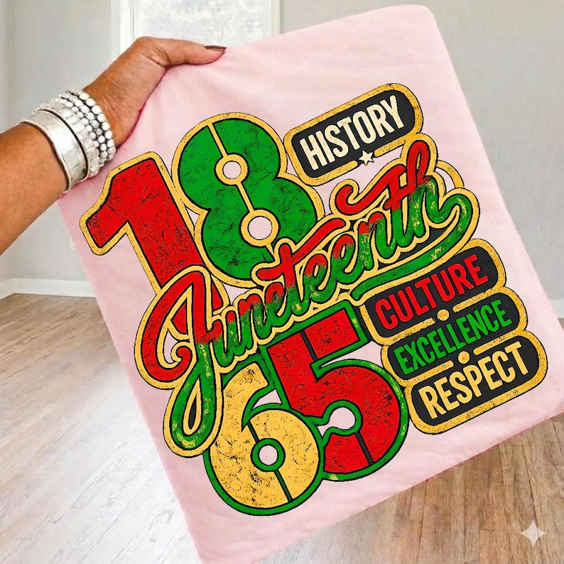 May include: A light pink t-shirt featuring a graphic design with the large numbers 18 and 65 in green and yellow, the word Juneteenth in red script, and the words History, Culture, Excellence, and Respect in black text with yellow borders.