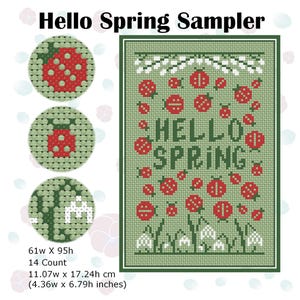 Puede incluir: Muestra de punto de cruz con el texto "Hello Spring" y diseños de mariquitas y flores. La muestra es verde con detalles en rojo y blanco. Incluye tres diseños circulares con mariquitas. Las dimensiones son 11,07 cm de ancho por 17,24 cm de alto.