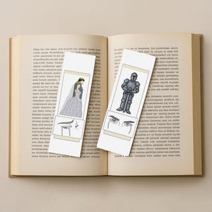 May include: Two decorative bookmarks rest on an open book. One bookmark features a pixelated bride in a gown, the other a knight in armor. Both have a yellow border and an illustration of eyes.